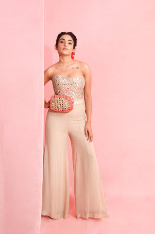 LARA : Ruffle sash concept Saree, styled with a mirror work embroidered Bikini top, ruffle sach draped to look like a saree around hand knotted tie and dyed Bell bottom pants