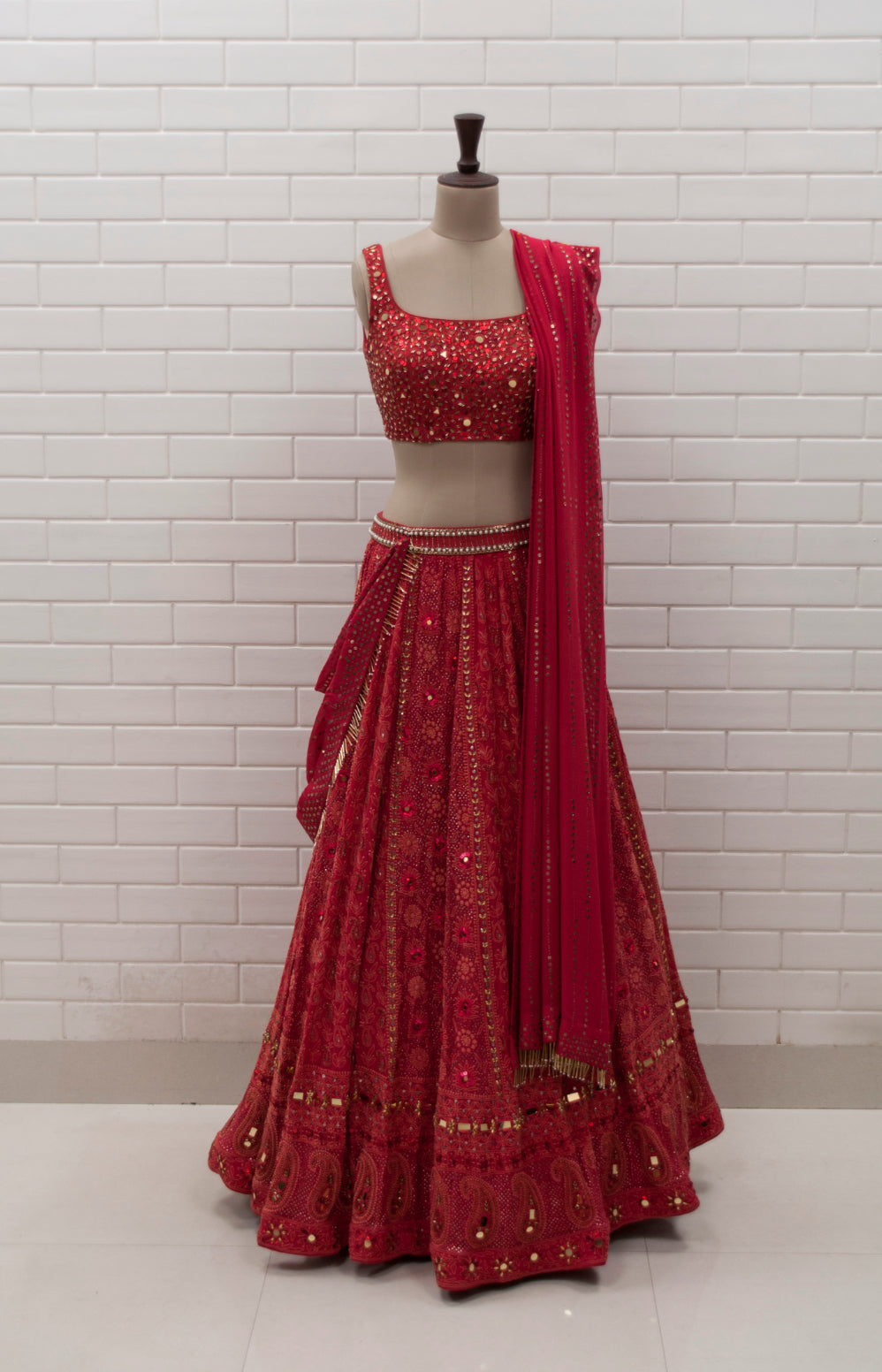 Peach embroidered lehenga with red blouse and pale orange dupatta available  only at Pernia's Pop Up Shop. 2024