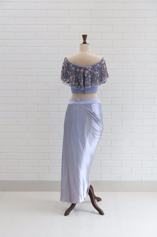 CARINA : Lilac Grey Off Shoulder flaired blouse in Floral Sequins and Beads embroidery with Satin Dhoti