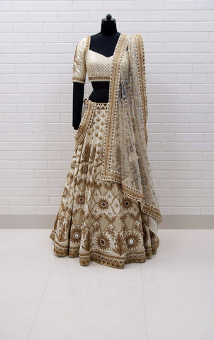 Peach Lehenga with Mirror Corset and Kundan cowl jacket