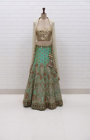 CLARISSA : Canyon Clay Ruffled Jacket with blouse and lehenga