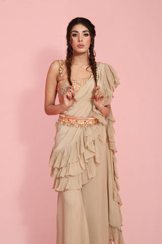 KARIANA : Balloon off shoulder sleeves with Chain texturing neckline paired with a hand knotted tie and dye handkerchief lehenga with chain belt detailing