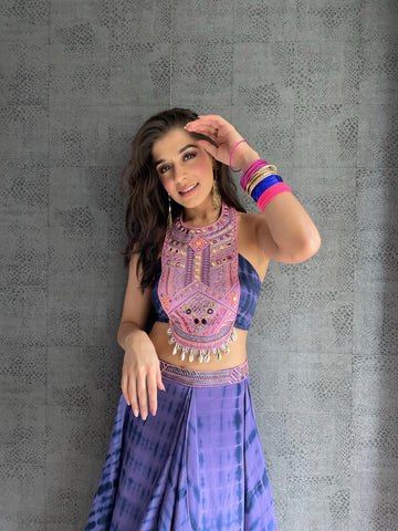 LOYOLA : Ruffle sash concept Saree, styled with a mirror work embroidered Bikini top, ruffle sach draped to look like a saree around Bell bottom pants